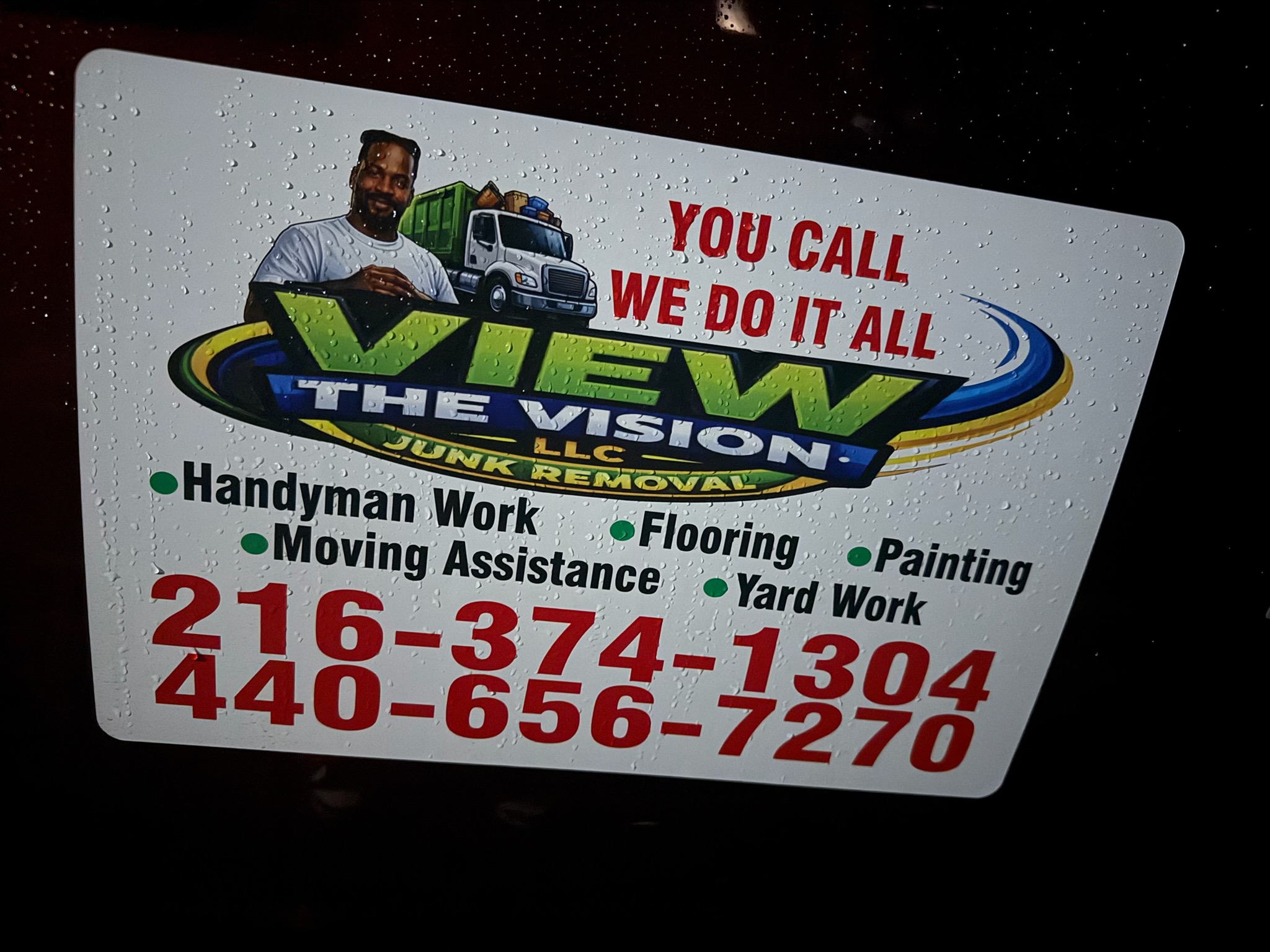View the Vision LLC junk removal sign card listing services and both phone numbers